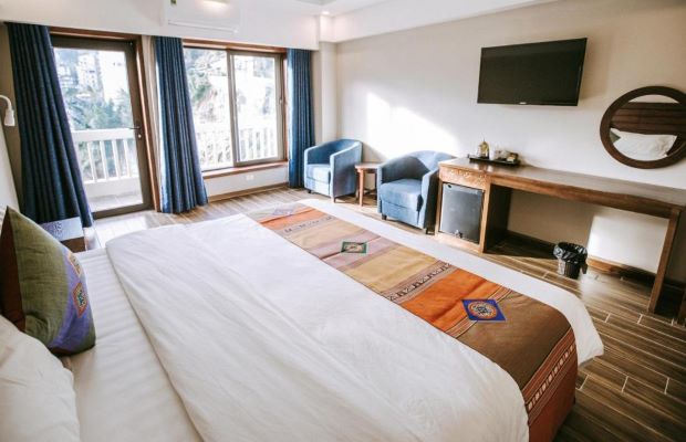 phòng ngủ tại khách sạn Charm Sapa